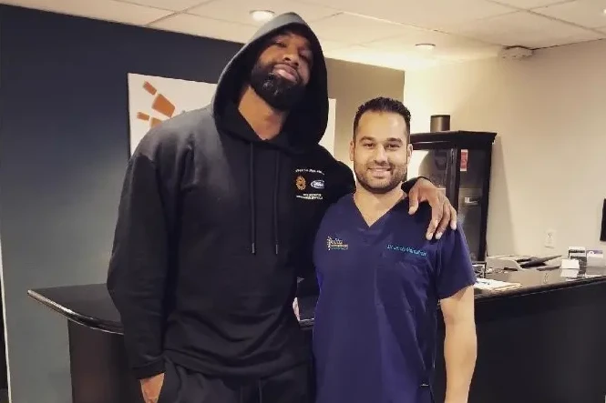 Home Page 54 Dr Jamie Mahtaban Posing With Patient Elite Chiropractic Beverly Hills Image